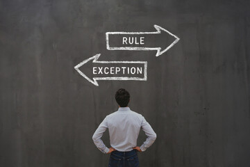 rule and exception arrows, special case, business man looking at arrows
