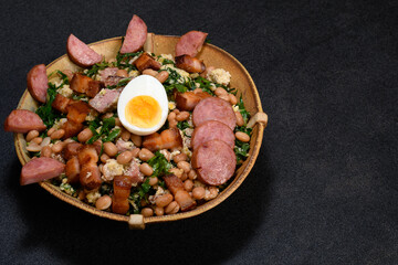 TROPEIRO BEANS, A TRADITIONAL DISH OF BRAZILIAN CUISINE FROM THE STATE OF MINAS GERAIS
