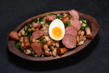 TROPEIRO BEANS, A TRADITIONAL DISH OF BRAZILIAN CUISINE FROM THE STATE OF MINAS GERAIS