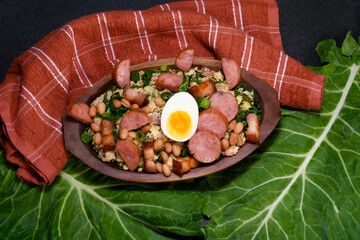 TROPEIRO BEANS, A TRADITIONAL DISH OF BRAZILIAN CUISINE FROM THE STATE OF MINAS GERAIS