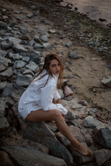 Untamed elegance on rocky beach