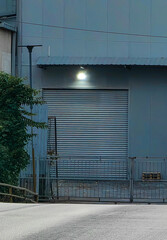 Urban Stillness: Closed Garage Door at Sunset