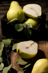 Autumn pears on table, fresh raw food ingredients
