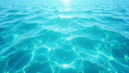 Obraz premium Bright turquoise ocean water with sunlight reflections
