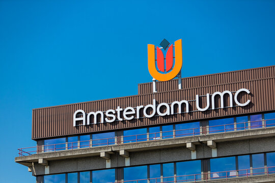 Amsterdam UMC Sign logo on the hospital. Amsterdam UMC is a medical center that combines patient care, scientific research, and education. Amsterdam, the Netherlands. 13 May 2023. 
