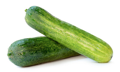 Side view of fresh long green cucumbers in stack isolated on white background with clipping path