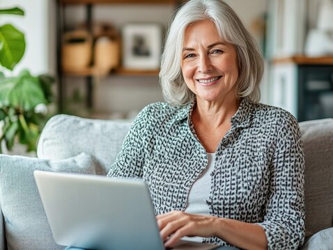 Elderly Woman with a Laptop, Happy and Engaged
