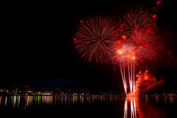 Brilliant Red Fireworks Bursting in the Sky-