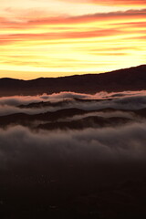 sunset over the clouds