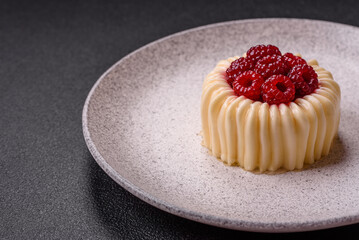 Sweet mousse tart with raspberries and filling