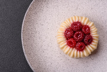 Sweet mousse tart with raspberries and filling