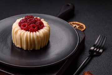 Sweet mousse tart with raspberries and filling