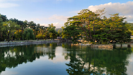 Garden Pond in Gyeongbokgung Palace, with blue sky on a sunny day, in Seoul, Korea