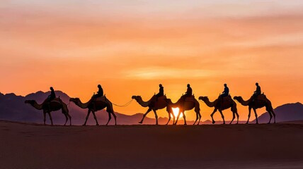Silhouetted camels and riders traverse the desert at sunset, creating a stunning desert landscape scene.