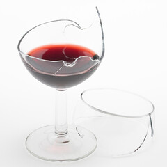 Addiction and liberation from alcoholism - Conceptual image with a broken glass of red wine
