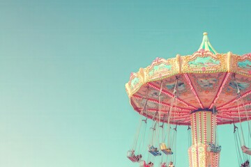 The vibrant swing ride spins joyfully at an amusement park, with swinging seats rising high above.