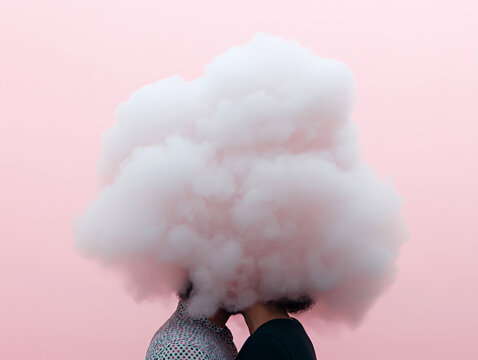 Two people with their heads obscured by clouds, symbolizing surrealism and creativity