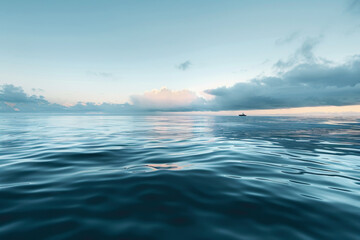 Obraz premium The ocean is calm and peaceful, with a boat in the distance