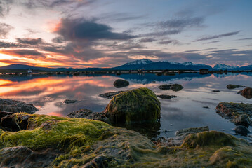 Dramatic sunset in the port of Puerto Natales, Chile
