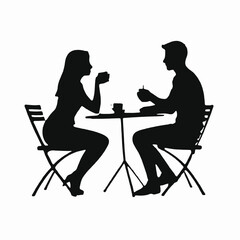 A young Caucasian man and woman sitting at a table, engaged in conversation
