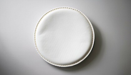 white oval frame on the wall