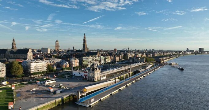 Boulevard at of Antwerp, Belgium, along the Schelde river, ferries, city skyline