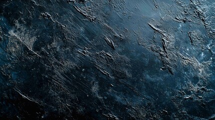 Obraz premium Dusty scratched and scanned old film texture of a metal surface, closeup; dark blue color for backgrounds 