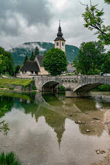 Church and bridge in the town of Bohinj in Slovenia