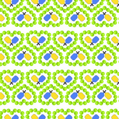 Heart shaped pattern made from pickleball balls and two rackets.