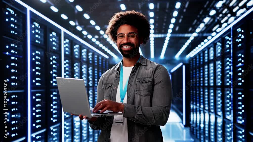 Poster happy engineer in data center server room configuring ai
