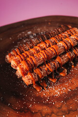 Churros caseiro com açúcar e chocolate, churros gourmet