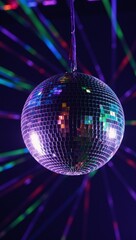 Obraz premium Vibrant mirror-ball spins casting a kaleidoscopic glow at a lively party scene