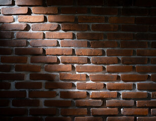 Obraz premium A close-up view of an old brick wall highlighting texture and shadow play in natural light