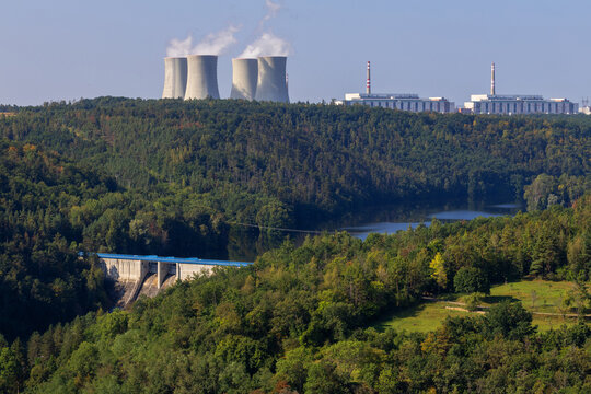Landscape around Dukovany nuclear power plant. In the foreground, the Mohel steppe and a valley with a water reservoir.