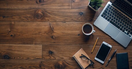 Modern Workspace Desk Setup with Laptop, Phone, and Coffee