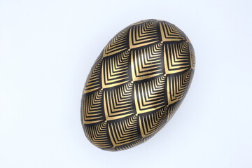 Golden Swedish easter egg. Filled with candy.