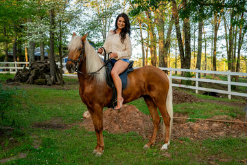 Springtime Joy: Southern Belle and Her Horse Enjoy a Picturesque Day in the Countryside