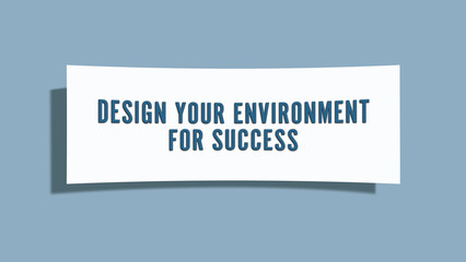 Design your environment for success. A card isolated on blue background.