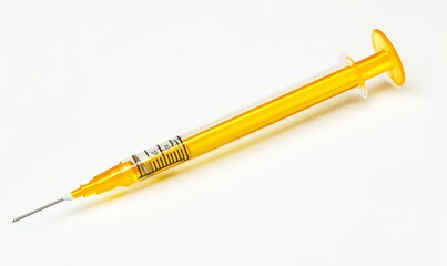 Close up yellow syringe on white background