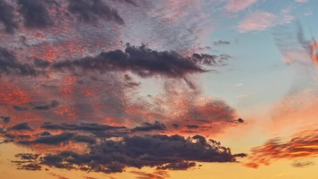 Timelapse of colorful pink skies and clouds at sunset