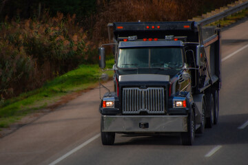 Heavy truck on a Canadian highway in the fall in Quebec