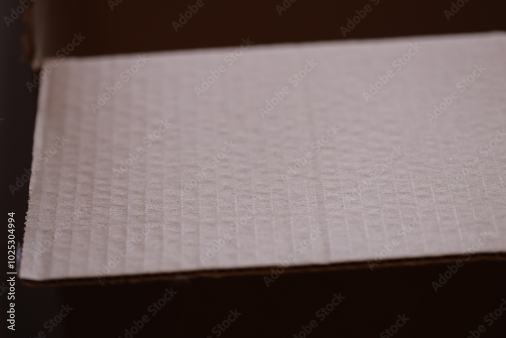 Poster close-up view of a piece of paper inside a box, suitable for use in educational or professional sett