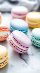 Obraz premium Vertical format, Colorful macarons arranged on a marble surface showcasing a variety of pastel hues and flavors