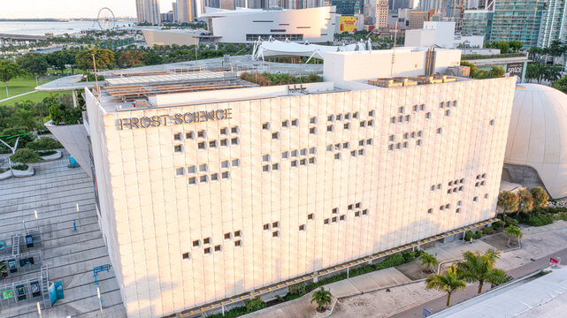 Phillip & Patricia Frost Museum of Science in Miami, Florida USA 9/14/2024 (Angle 2) 

An aerial sunset shot of the Frost Science museum located in downtown Miami near the Kaseya Center arena. 
