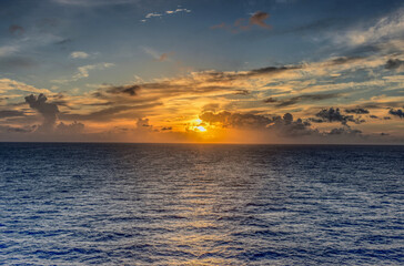 sunset over the sea with clouds 