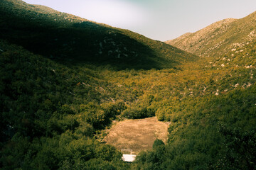Abandoned Football Field in Remote Mountain Valley