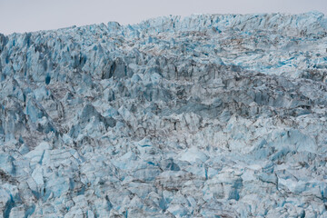 Aialik Glacier landscape in Kenai Fjords National Park leading to the Harding Icefield near Seward, Alaska - blue glacier texture 