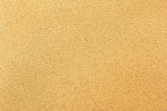 Brown gold texture background. Soft brown gold sand texutred surface