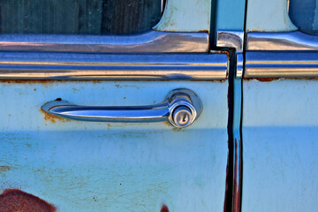 Closeup of Door handle of 1950’s era car