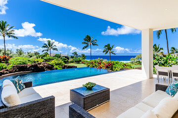 Fototapeta premium a modern Hawaiian lanai with expansive ocean view, blending indoor-outdoor living